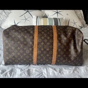 Louis Vuitton Keepall travel bag.